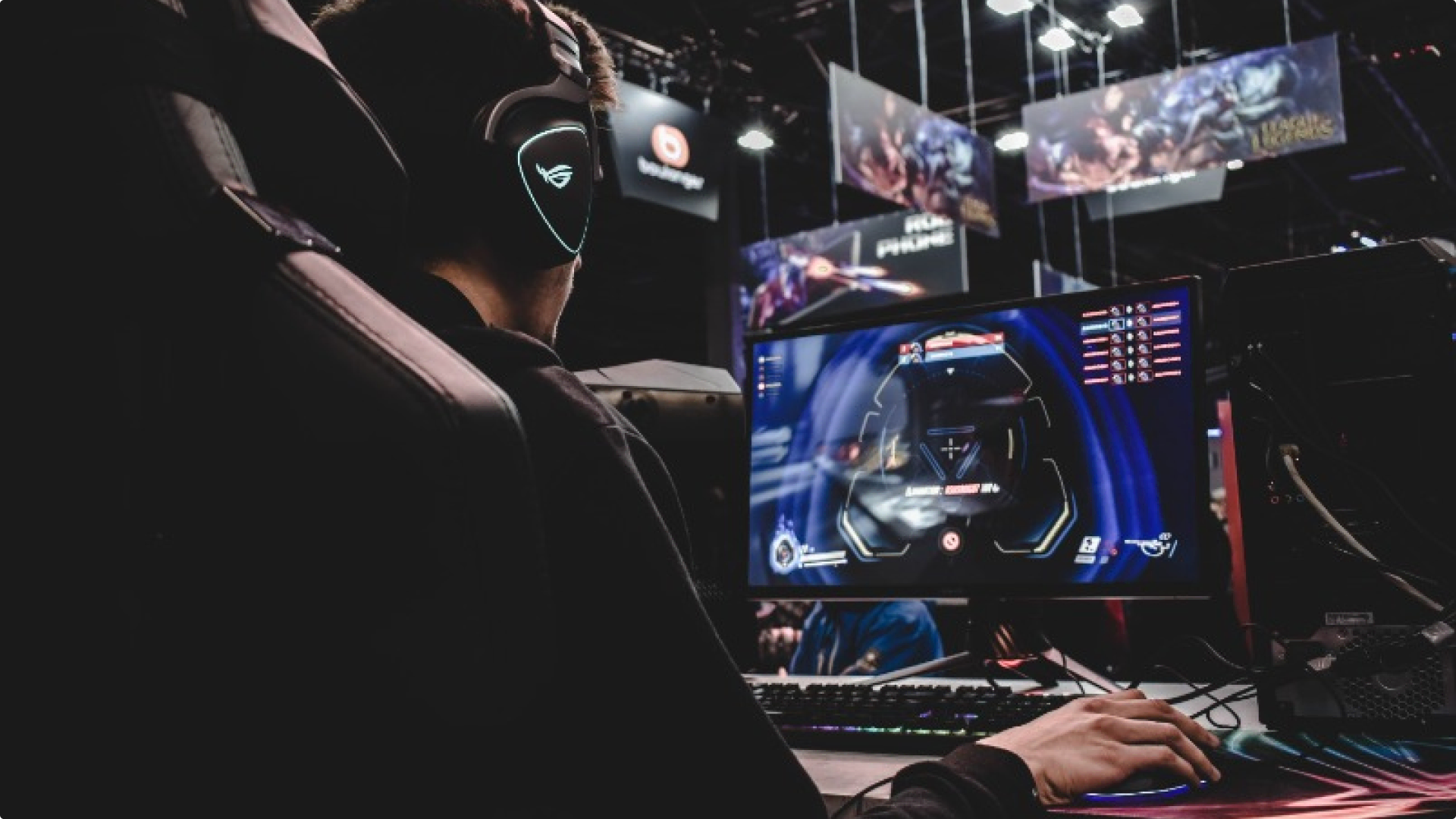 people playing competitive games on computers